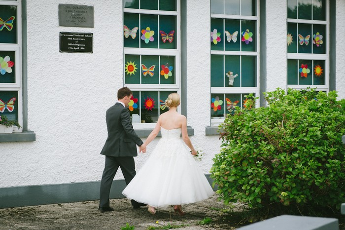 bride and groom outside school wedding by rory o'toole 